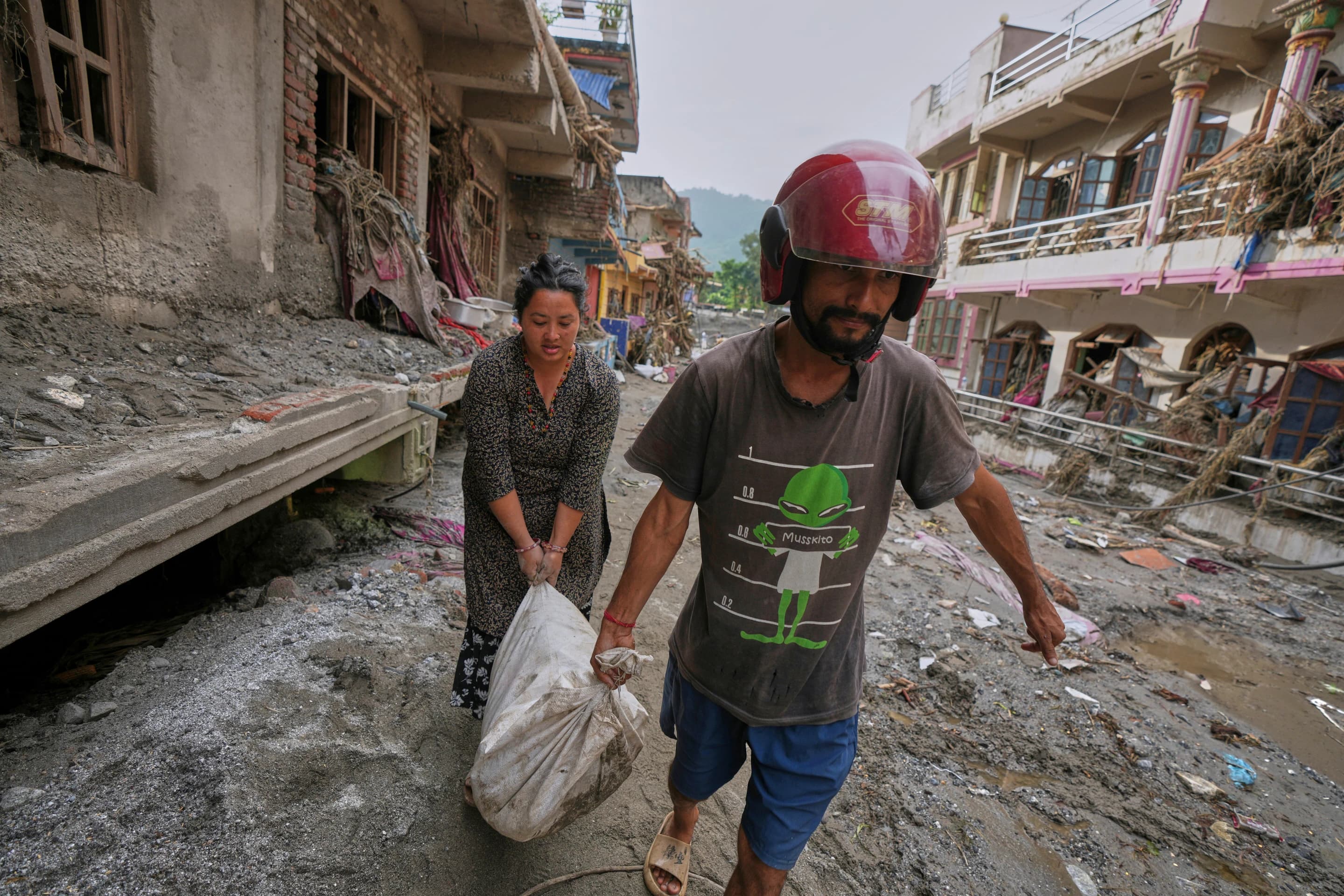 Nepal-China Flood Survivors Reach Safe Areas as Families Await News of Nearly 3,000 Missing Nepal-China Flood Survivors Reach Safe Areas as Families Await News of Nearly 3,000 Missing